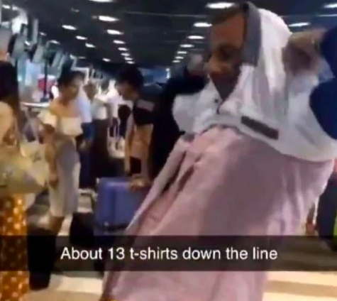 man wears 15 Shirts to save baggage fine