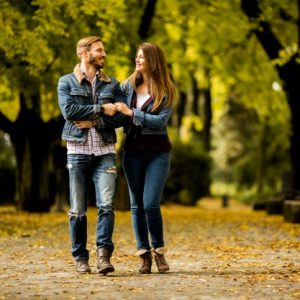 loving-couple-autumn-park_52137-8279