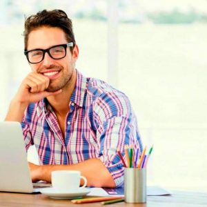 portrait-young-man-sitting-his-desk-hard-working-man-ss-feature